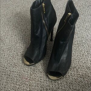 Steve Madden Black and Gold Heeled Boots